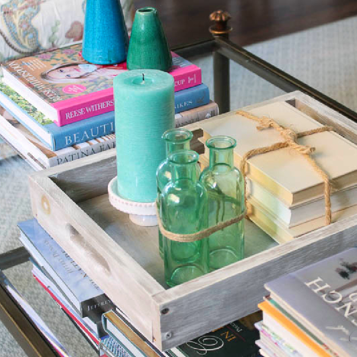 how to decorate with stacked books on coffee table