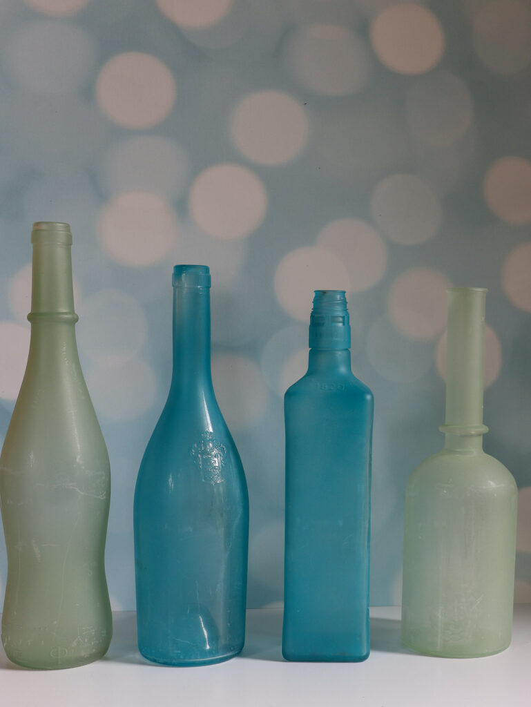 sea glass painted bottles in aqua and sea foam