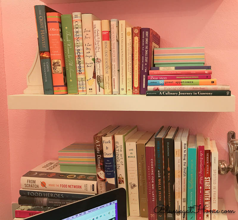 stacked books in home office