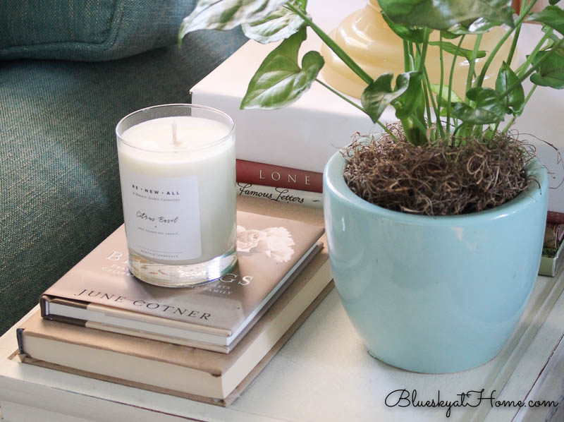 candle on stack of books