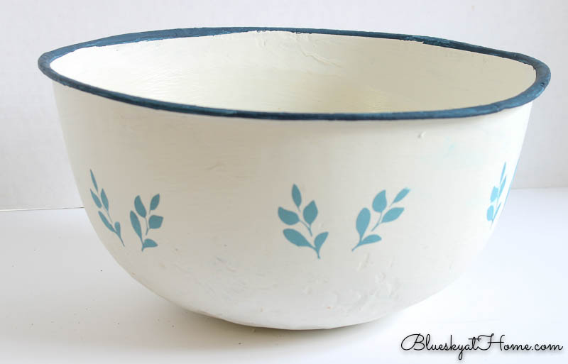White painted flea market bowl with blue flower stencils