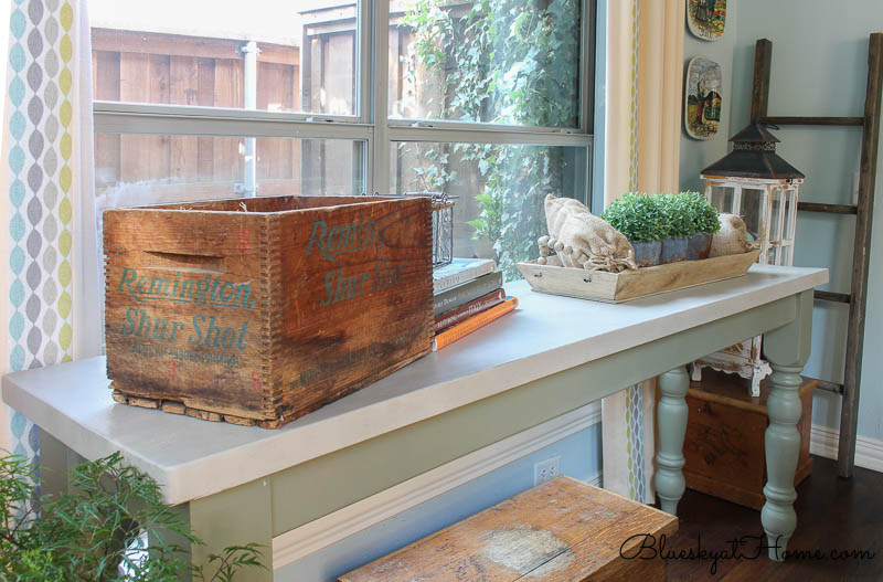 wood box on table with books