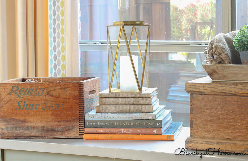 reused and restyled brass and glass lantern with candle