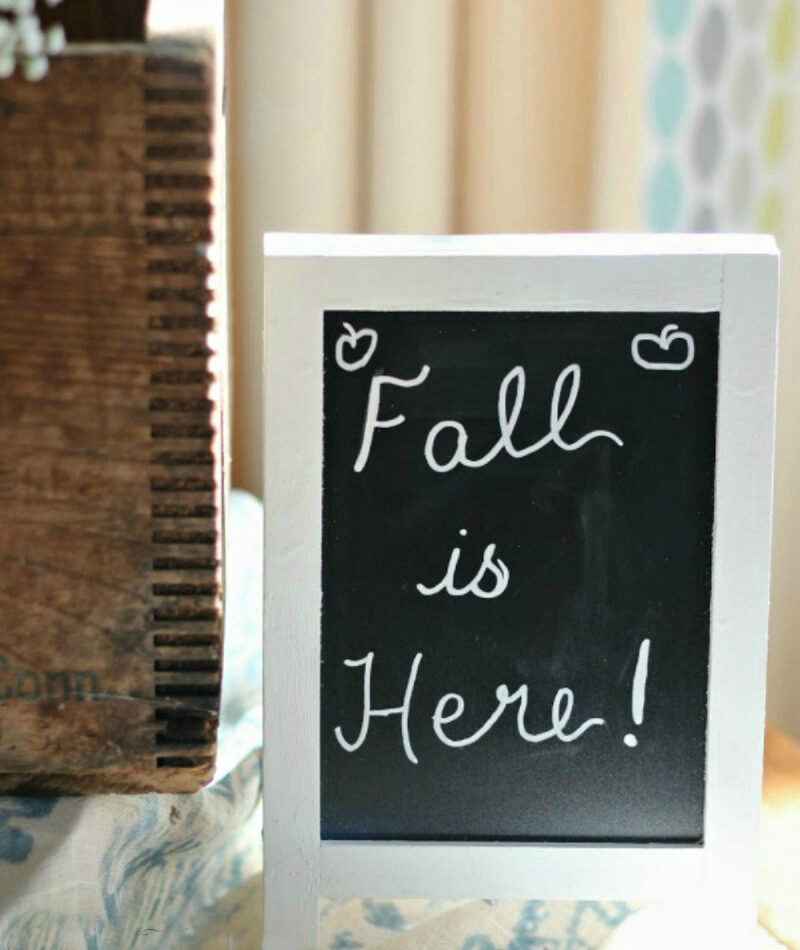 fall buffet table with fall chalk sign