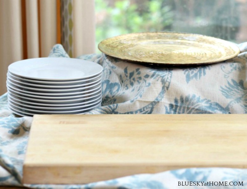 white plates and wood cutting board