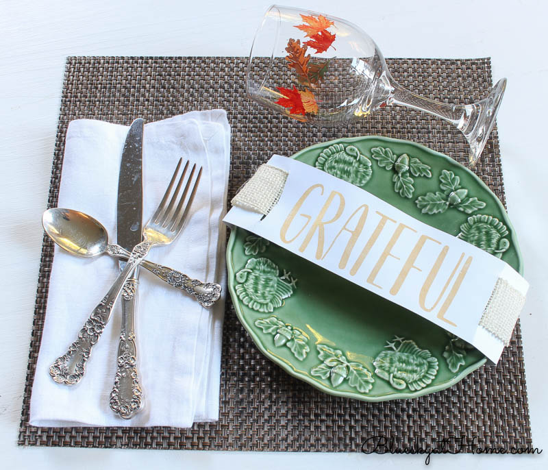 fall place setting with grateful sign and wine glass