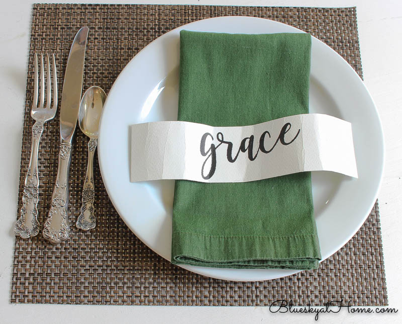 fall place setting with green napkin