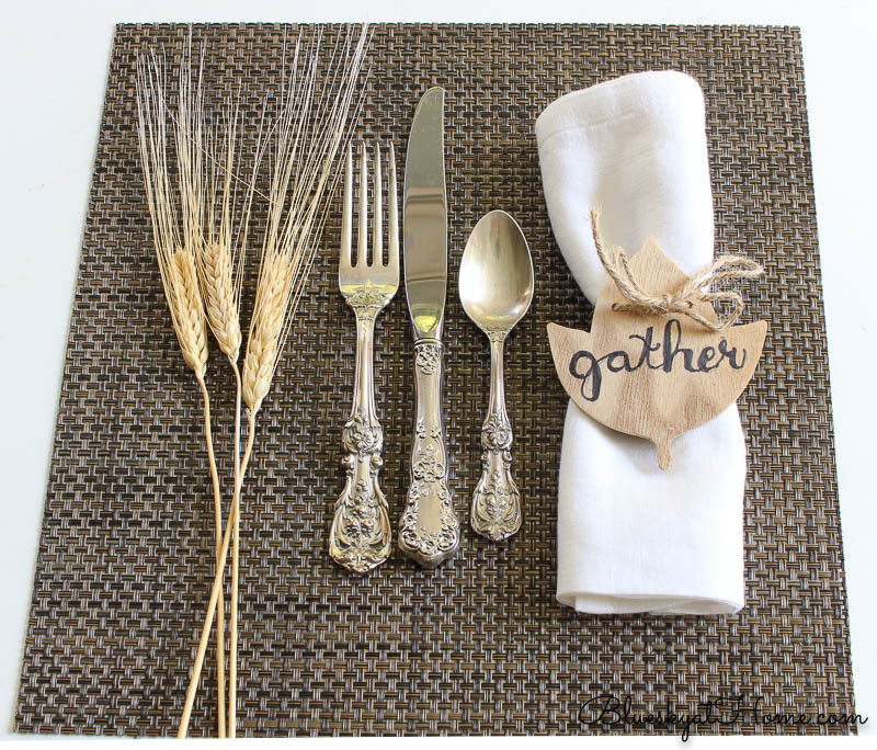 fall place setting with gather napkin ring and wheat