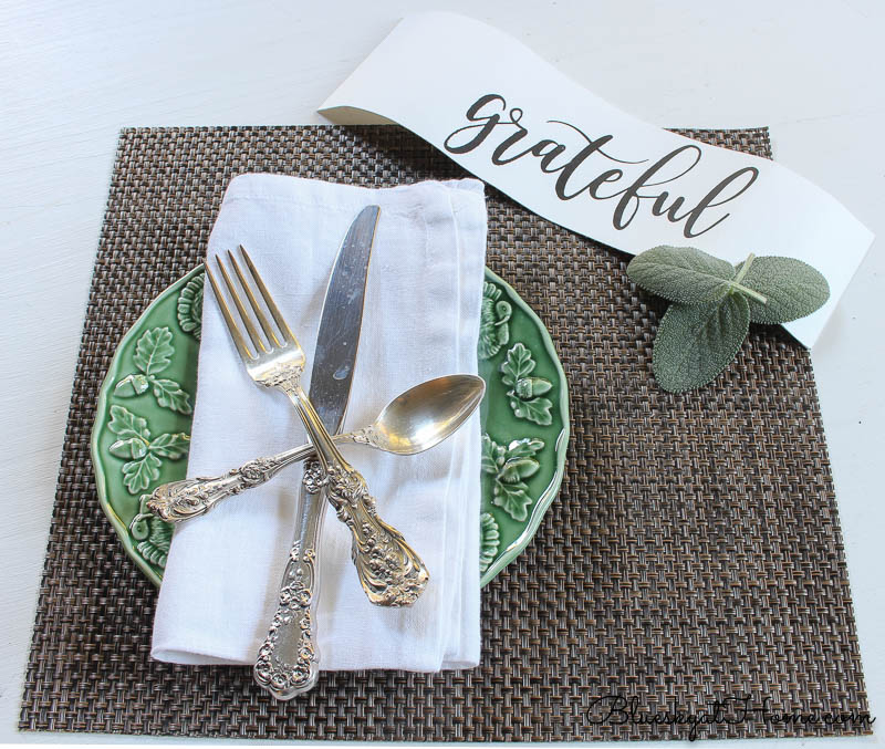 fall place setting with grateful sign and herbs