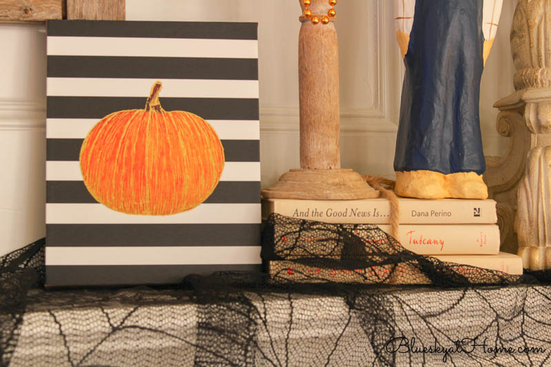 pumpkin sign with black and white stripes