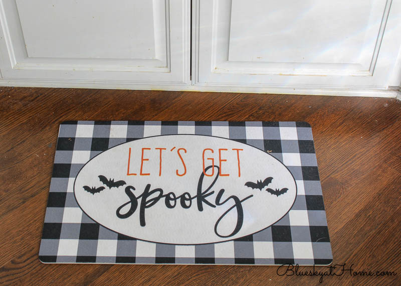 let's get spooky kitchen mat