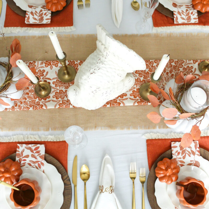 Thanksgiving tablescape with oranges and whites