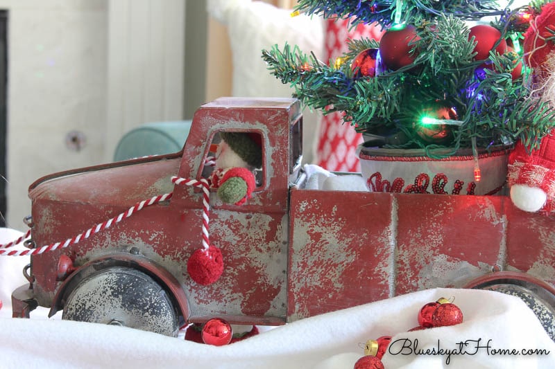 red vintage truck decorated for Christmas