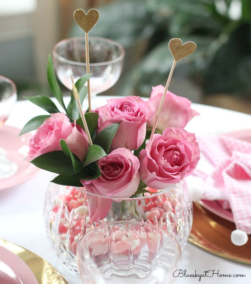pink roses in glass vase for Valentine tablescape