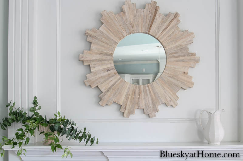 wood mirror on mantel