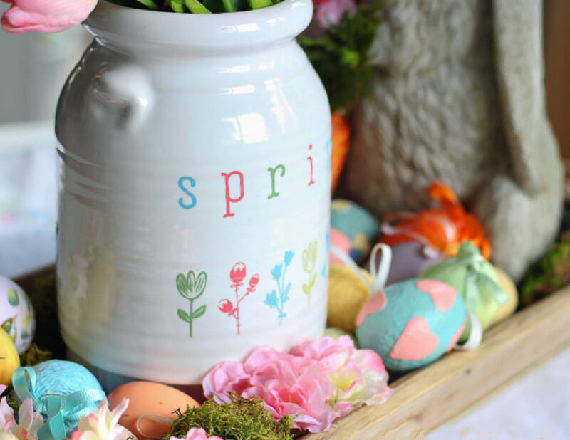 Easter centerpiece with bunnies and blooms in pink and yellow tulips