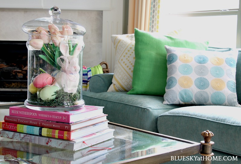 book stack with Easter glass jars and bunnies