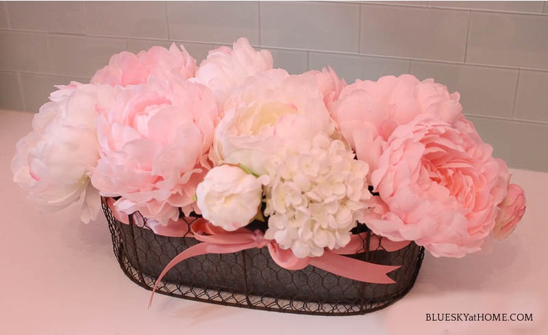 faux pink flower arrangement