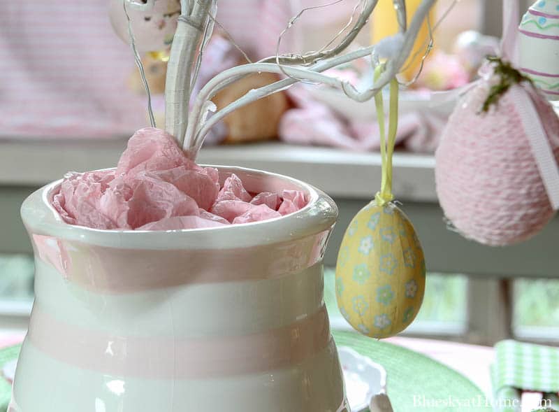 pink and white pitcher with pink paper