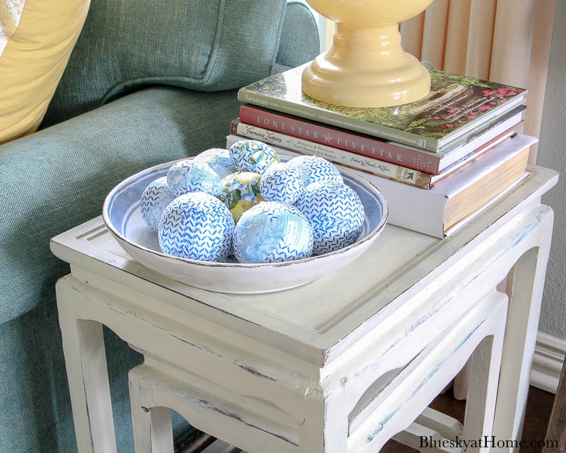 blue patterned decorative balls in bowl