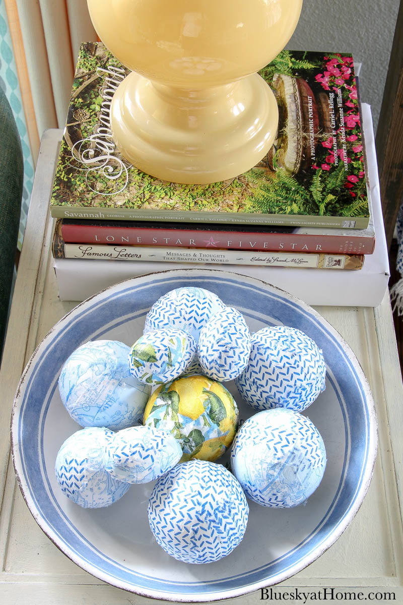 blue patterned decorative balls in bowl