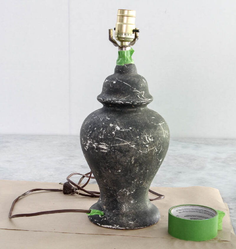 charcoal grey painted ginger jar lamp with painters' tape