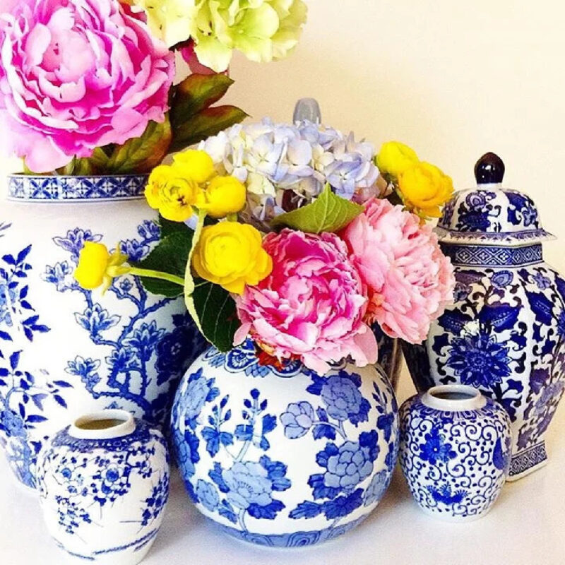 group of chinoiserie vases with pink and yellow flowers