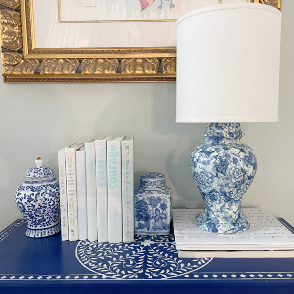 decoupage chinoiserie lamp on blue chest
