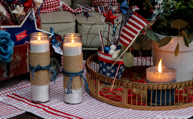 candles lit and 4th of July decorations at night
