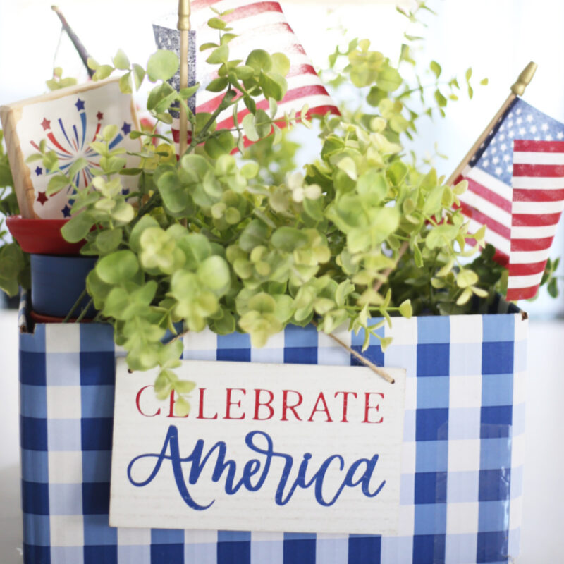 red white and blue centerpiece in a box