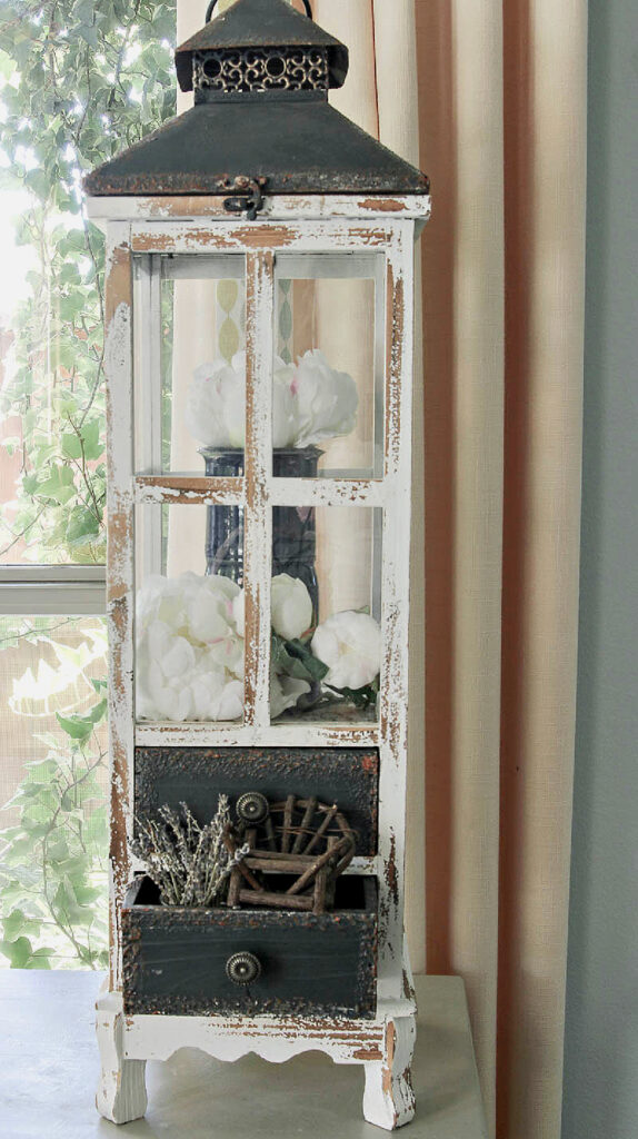 blue vase with white hydrangeas