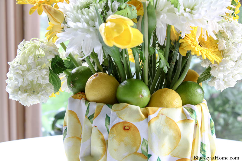 yellow and white flowers in summer centerpiece