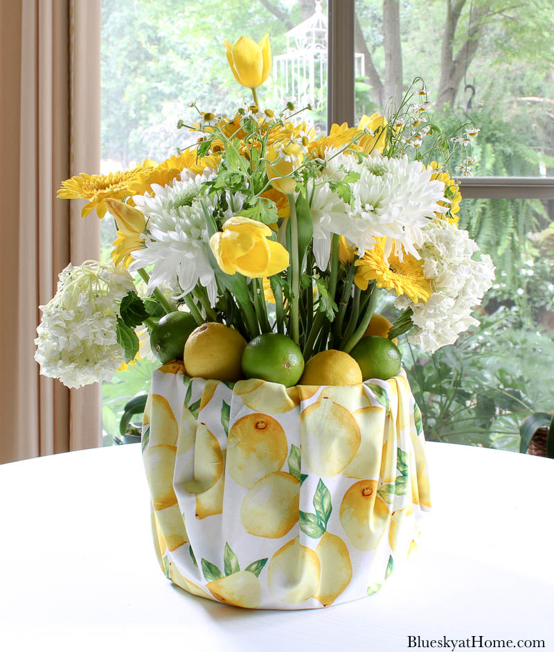 yellow and white flowers in summer centerpiece