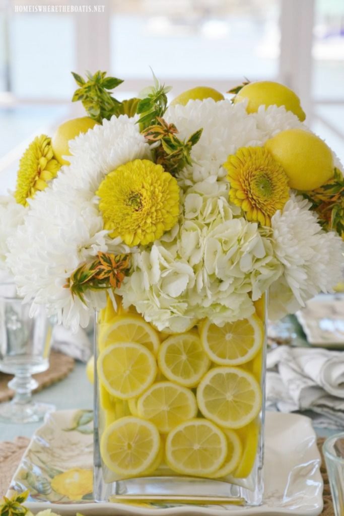 clear vase with lemons