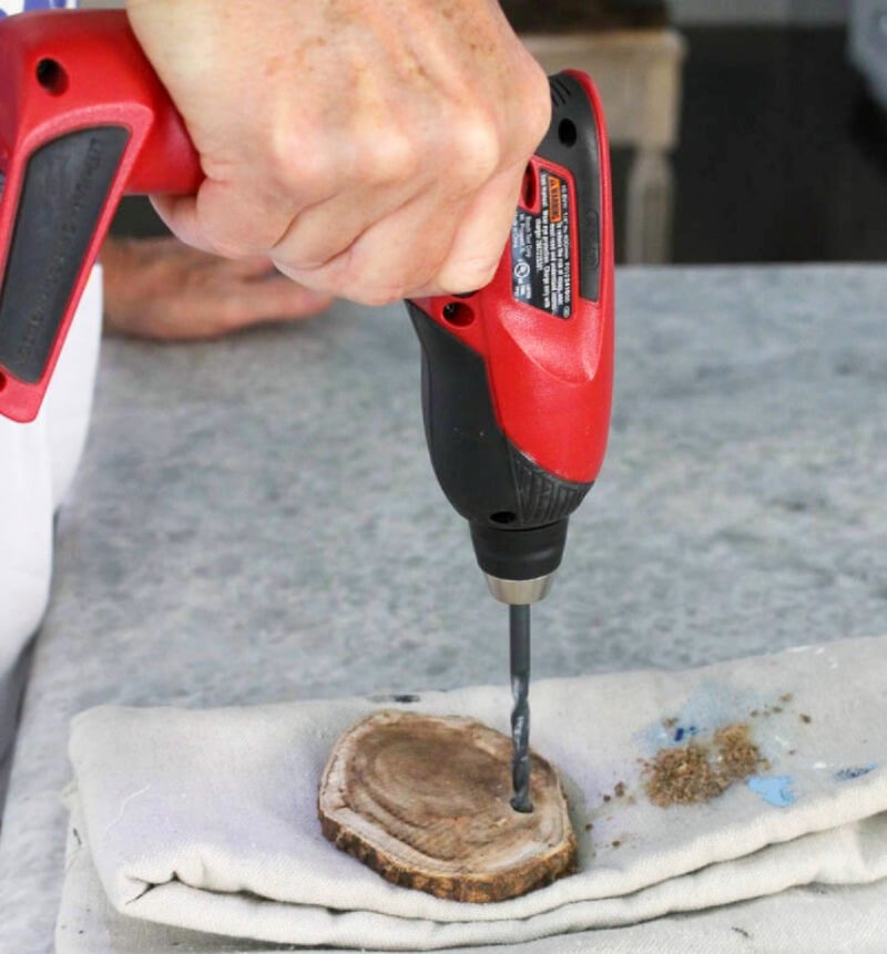 drilling hole in wood slice for mason jar project