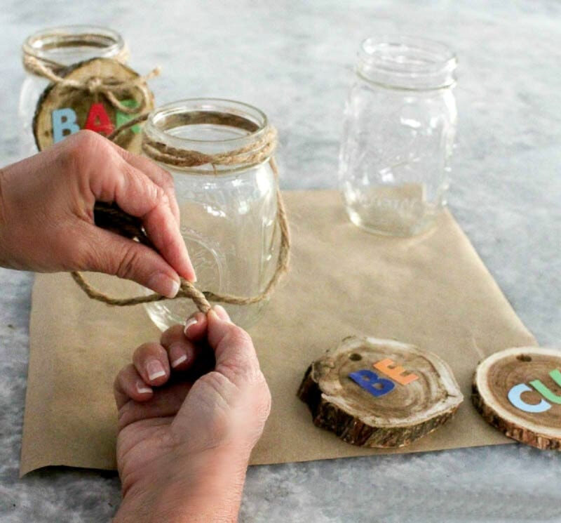 wrapping twine around mason jars