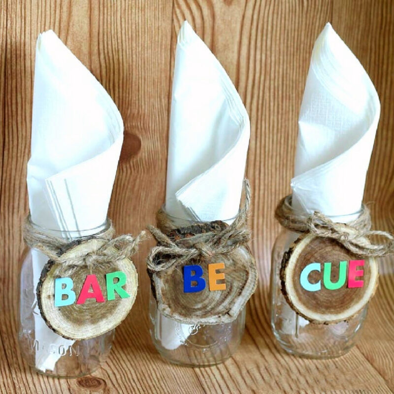 napkins in decorated mason jar