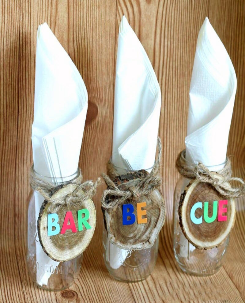 napkins in decorated mason jar