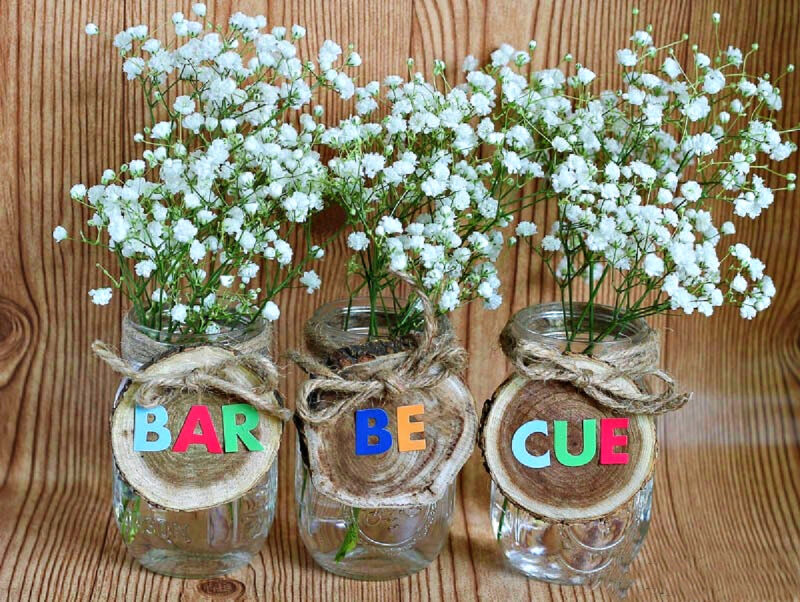 flowers in decorated mason jars