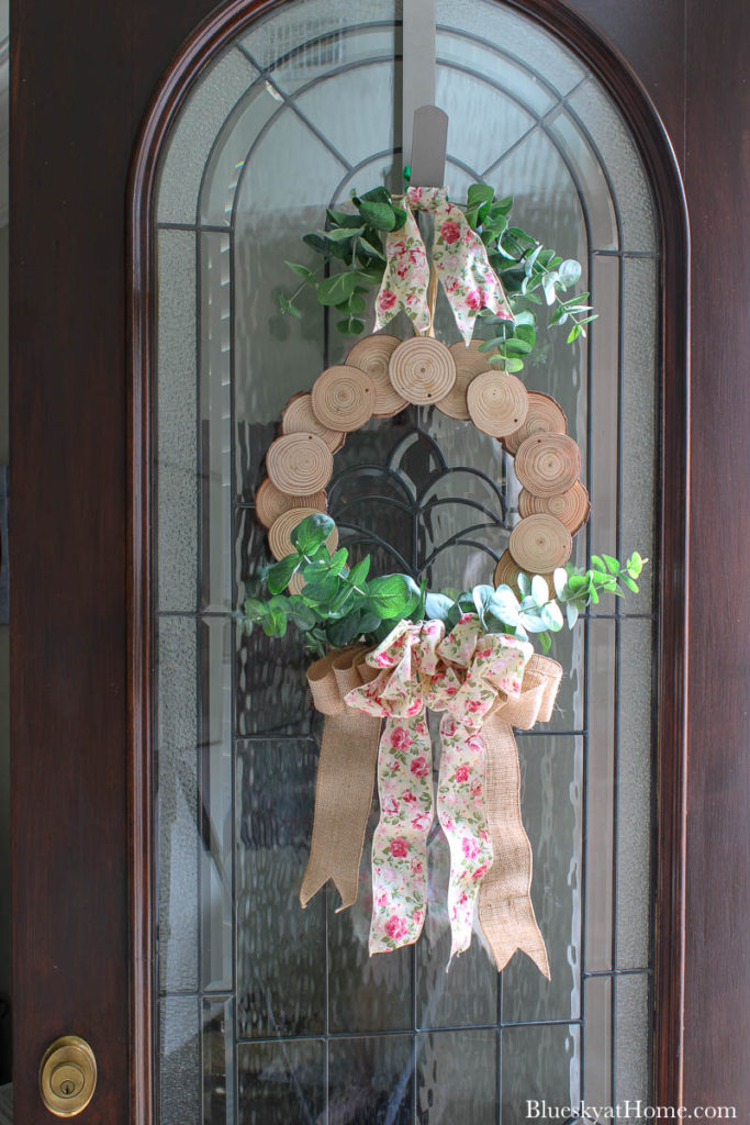 wood slice wreath on front door