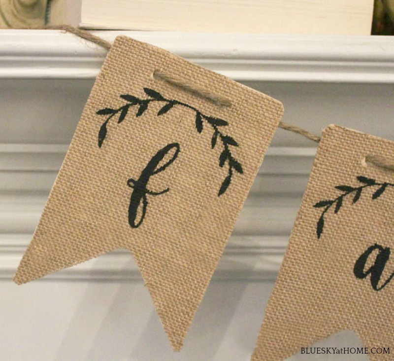 wood and burlap fall banner on mantel