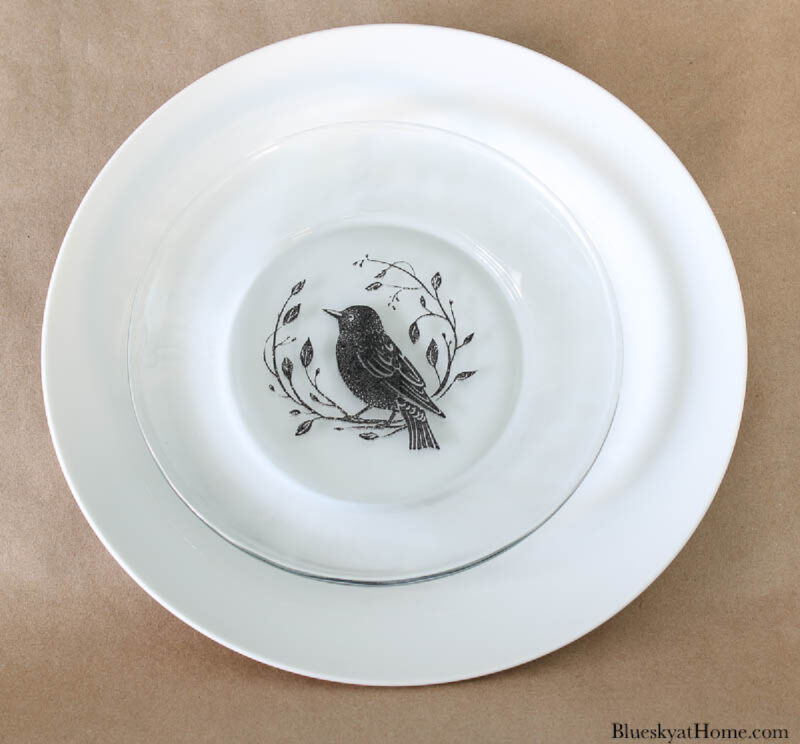 bird stencil on glass plate with ceramic paint