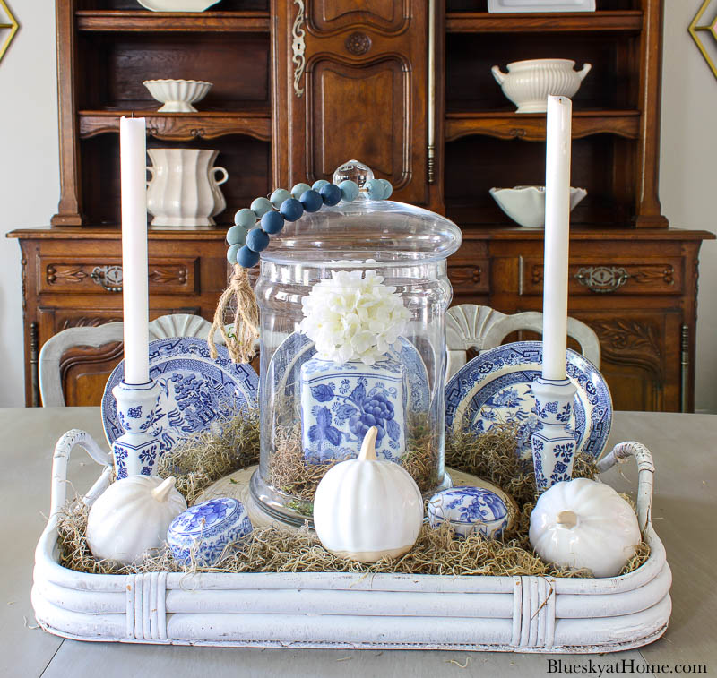 blue and white fall vignette with candles