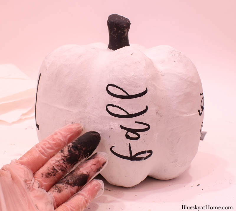 painting word fall on white pumpkin