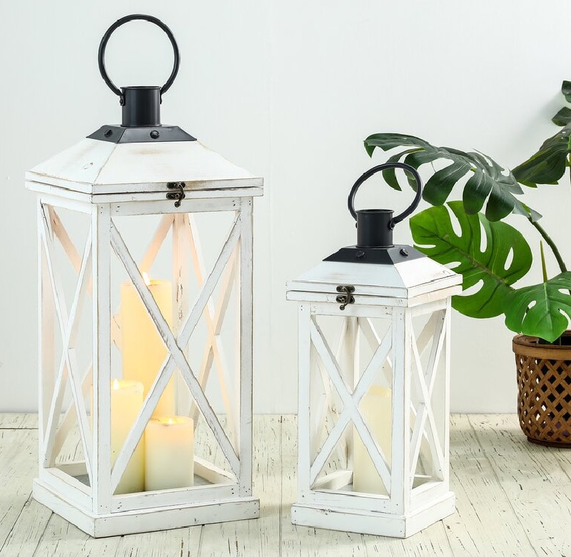 2 white and glass lanterns