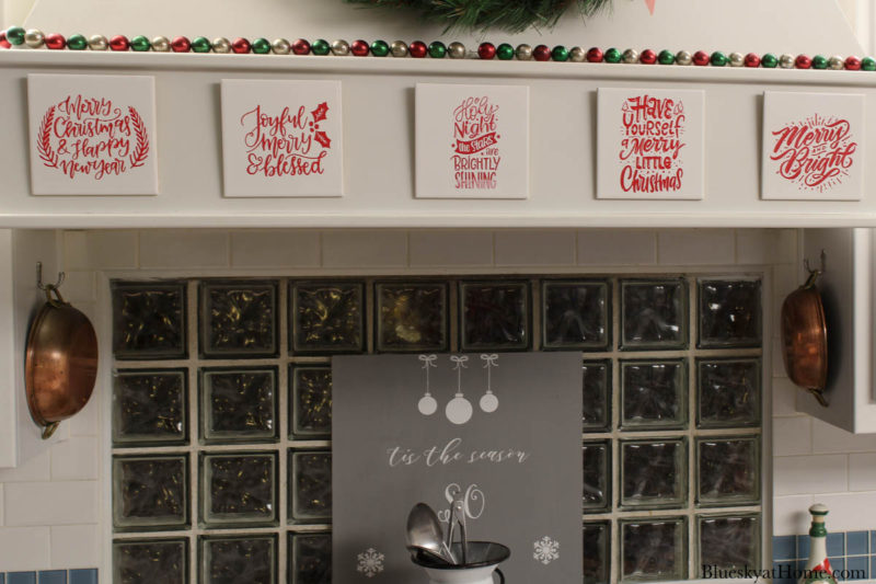 Christmas tile with stencils on stove hood