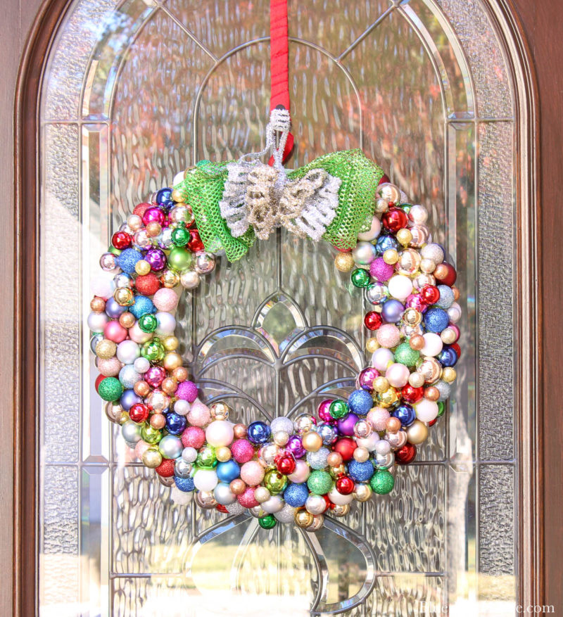 Christmas ornament wreath on front door