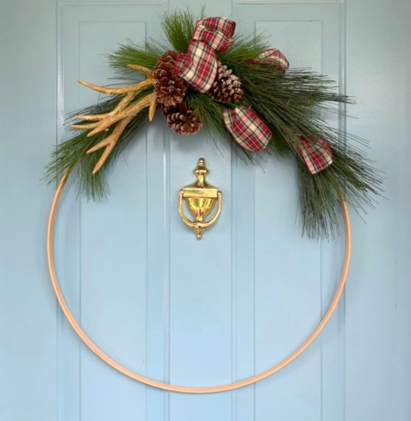 hoop wreath with garland and plaid ribbon