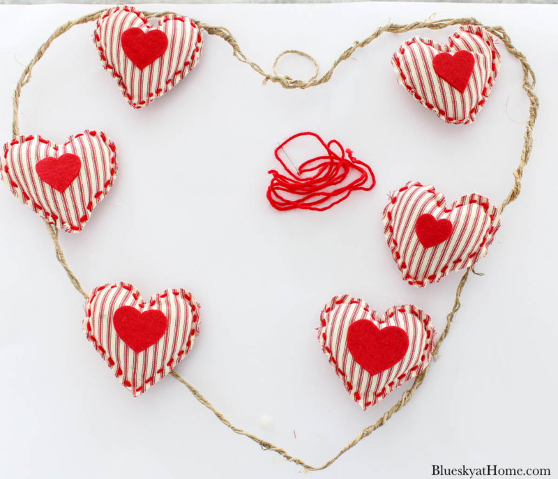 Valentine wreath with red fabric hearts