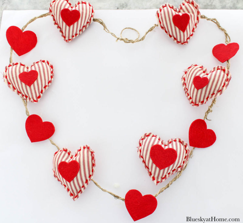 Valentine wreath with red fabric hearts
